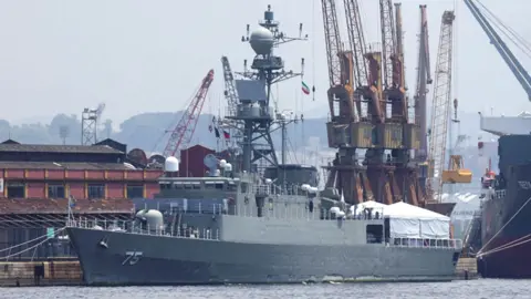 This Reuters pic might be clearer. FILE PHOTO: Iranian military ship Iris Dena is pictured berthed in Rio de Janeiro's port, Brazil, February 28, 2023. REUTERS/Ricardo Moraes/File Photo dena_reuters_1.jpg  