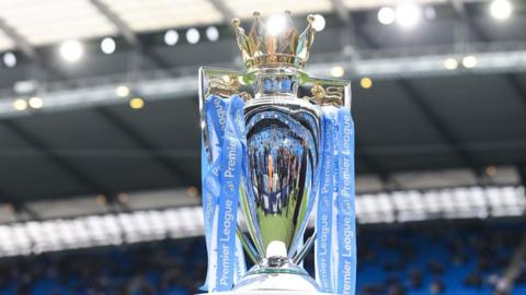 The Premier League trophy