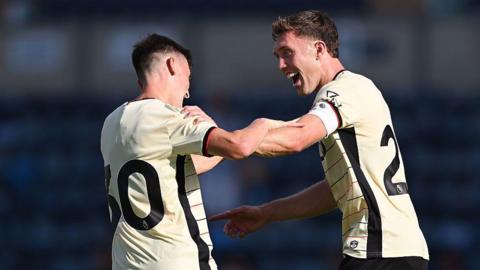 Cameron Humphreys of Ipswich Town celebrates with teammate Dara O'Shea