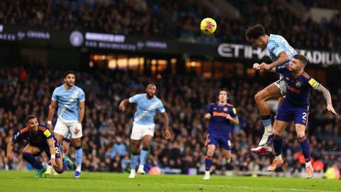  Nico O'Reilly of Manchester City scores