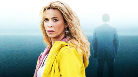 Eve Myles as Faith Howells in the TV series 'Keeping Faith. She is wearing a bright yellow coat and stares into the camera with a concerned look on her face. Behind her, a there is a silhouette of a man with his back turned to the camera.