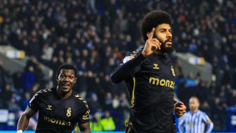 Ellis Simms celebrates his match-winning second goal at Sheffield Wednesday