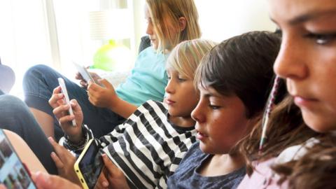 Children on their phones