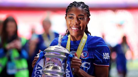 Ashley Lawrence holds the Women's FA Cup trophy