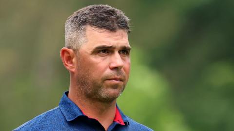 Gary Woodland walking on a golf course