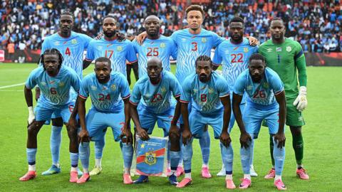 Congo's players pose for a group photo prior to the international friendly football match between Denmark and DR Congo 