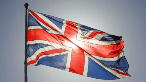 Shows a union flag in red white and blue