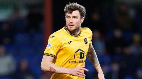 Robbie Muirhead in action for Livingston