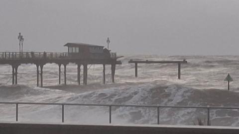 A general view of Teignmouth Grand Pier showing part of the structure destroyed.