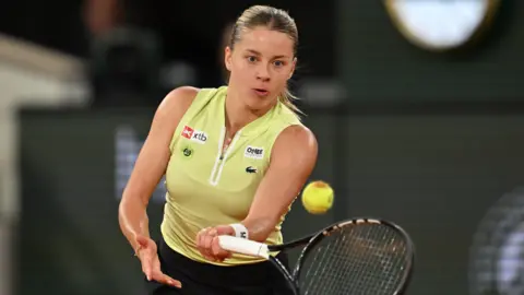 Mirra Andreeva celebrates