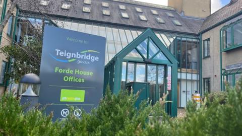 The sign for Teignbridge District Council at its offices in Newton Abbot