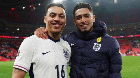 Morgan Rogers and Jude Bellingham pose for a photo together after an England game