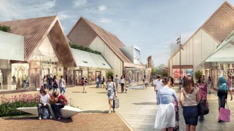 A computer-generated artist's impression of a outdoor shopping centre with a broad pedestrian avenue and modern-looking cream-coloured retail outlets with steep roofs to either side. People can be seen walking in casual clothes on a sunny day and sitting on designer benches. Fountains and flower beds can be seen.