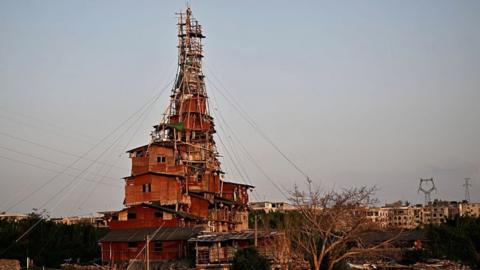 China's strangest "nail house" - households that refuse to move in the face of development plans.