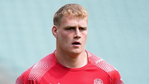 Arthur Clark standing during a training session for England