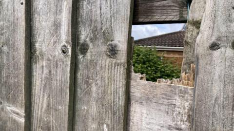 Hole in the fence allegedly used to sell drugs