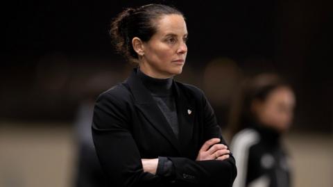 Rhian Wilkinson on the touchline 