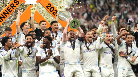 Aston Villa's John McGinn (centre) lifts the trophy with team-mates after winning the UEFA Europa League final at Besiktas Park, Istanbul.