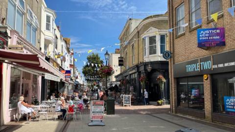 A picture of people walking up Warwick Street in Worthing