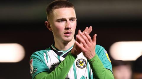 Matt Baker applauds Newport County fans