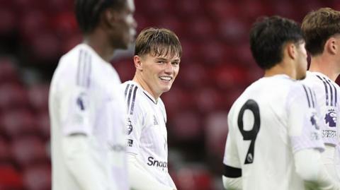 Ethan Ennis playing for Manchester United 
