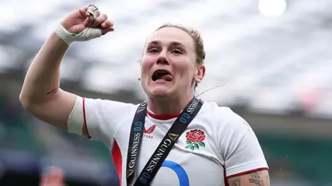 England captain Meg Jones celebrates victory