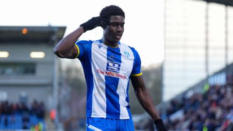 Micah Mbick celebrates his goal for Colchester United 