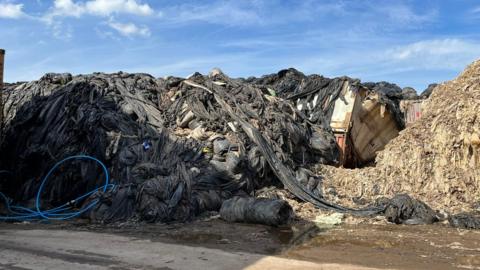 Damaged recycling after a large fire