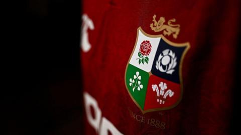 A close-up of the 2025 rugby shirt showing the Lions' logo.