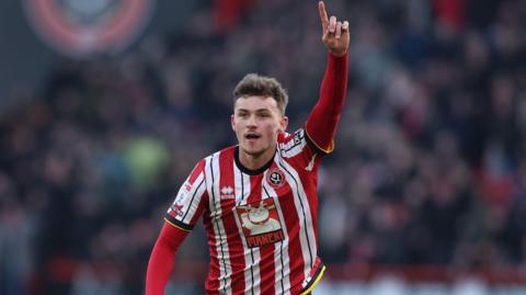 Harrison Burrows celebrates after putting Sheffield United ahead against Norwich City