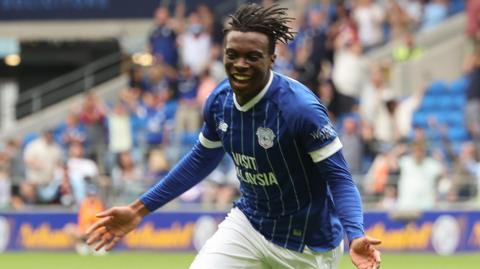 Ronan Kpakio celebrates scoring for Cardiff