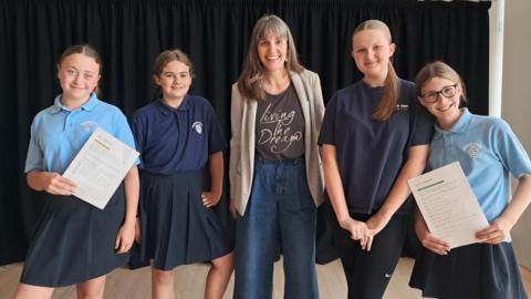 Cornerstone workshop leader Laura Howells-Green with students