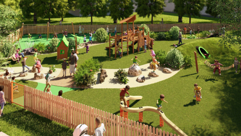 An artist's impression of what the new playground for younger children could look like, featuring a wooden climbing frame and wendy house in a green area, surrounded by a natural wood picket fence