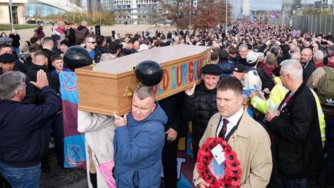 West Ham fans with a coffin