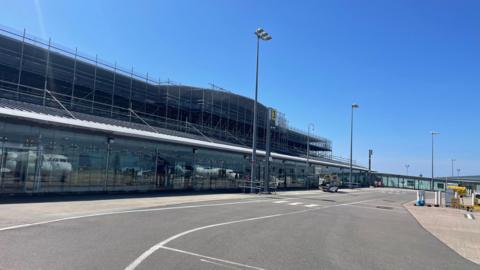 General view of airport and Aurigny plane.
