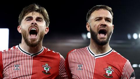 Adam Armstrong(R) of Southampton celebrates with team mate Ryan Manning 
