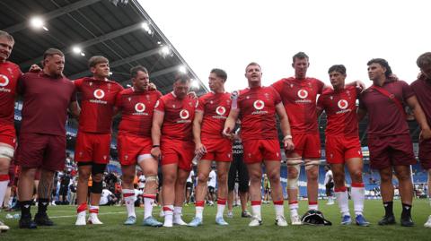 Dewi Lake speaks to his players after the 39-24 win against Fiji