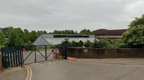 The gates of the former job centre site