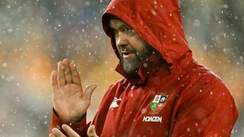 Andy Farrell applauds in the rain