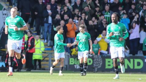 Muhamed Tijani of Plymouth Argyle celebrates his goal