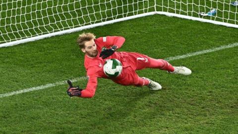 Caoimhin Kelleher saving a penalty