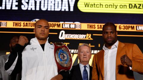 Fabio Wardley (left) and Daniel Dubois (right) stand side-by-side and hold up a fist