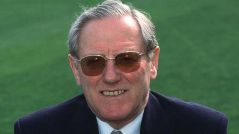 A portrait of Mike Smith taken while chairman of Warwickshire County Cricket Club in 1996