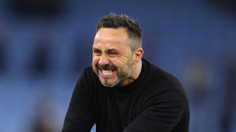 Tottenham manager Roberto de Zerbi celebrates after the win at Aston Villa