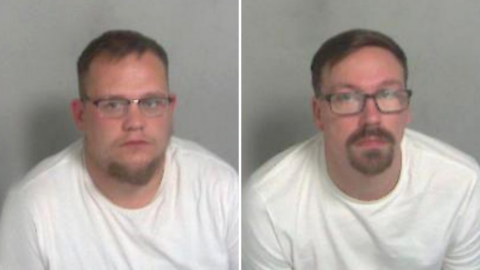 Police mugshots of Ricky Mackmurdie and Ben Barnham. Both have short hair and beards, and they are wearing glasses and white T-shirts.