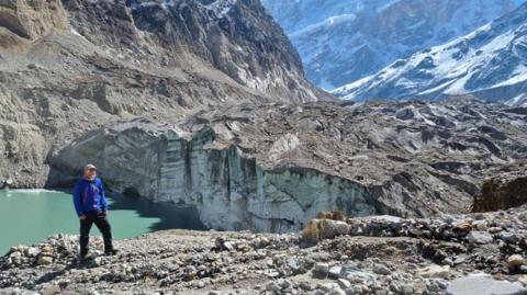 Professor Duncan Quincey surveys the debris-covered tongue of the Khumbu Glacier from the peak of Kala Patthar, Nepal 