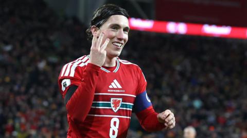 Harry Wilson celebrates his third goal