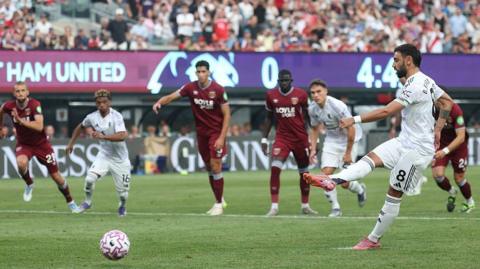 Manchester United skipper Bruno Fernandes converts an early penalty against West Ham at the MetLife Stadium on Saturday