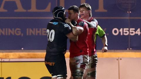 Morgan Morris and Jarrod Taylor grapple in Ospreys derby win at Scarlets