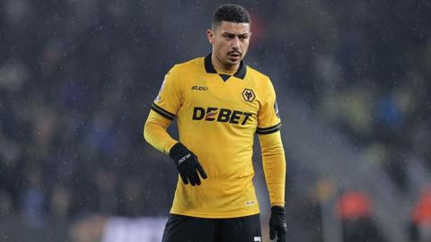 Wolves midfielder Andre looks on
